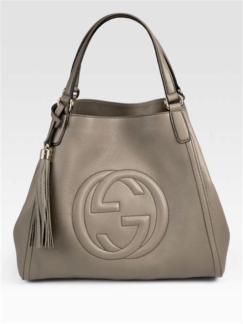 grey Gucci purse